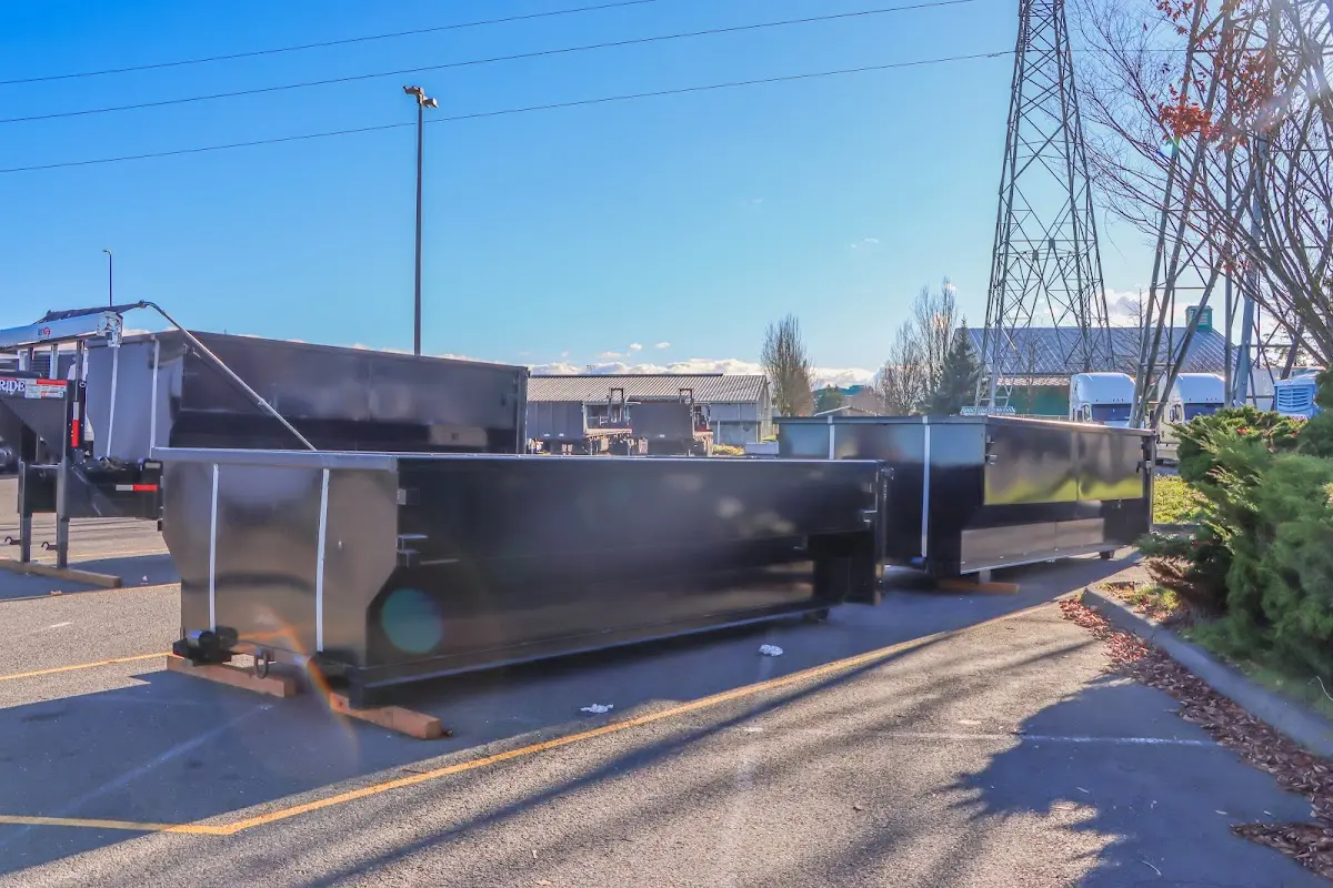 Roll-off dumpster ready for waste disposal at job site for 15 Yard Dumpster Rental in Opp